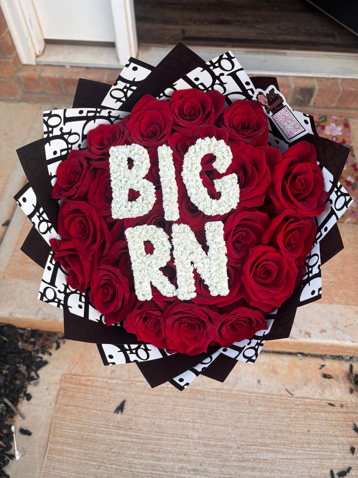 25 Count Red Rose Bouquet W/ Baby Breath phrase